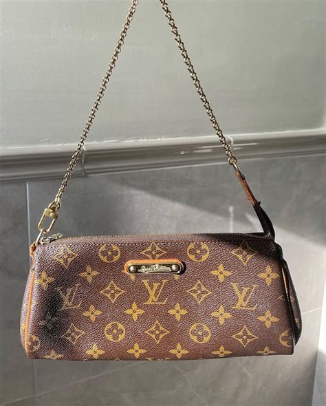 louis vuitton beige clutch|louis vuitton eva clutch outlet.